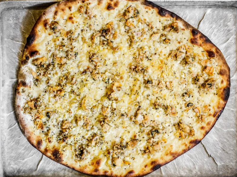 Frank Pepe's White Clam Pizza is the original clam pie.